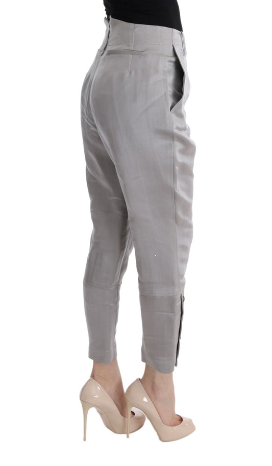 Pair of grey pants with side pockets and zipper details