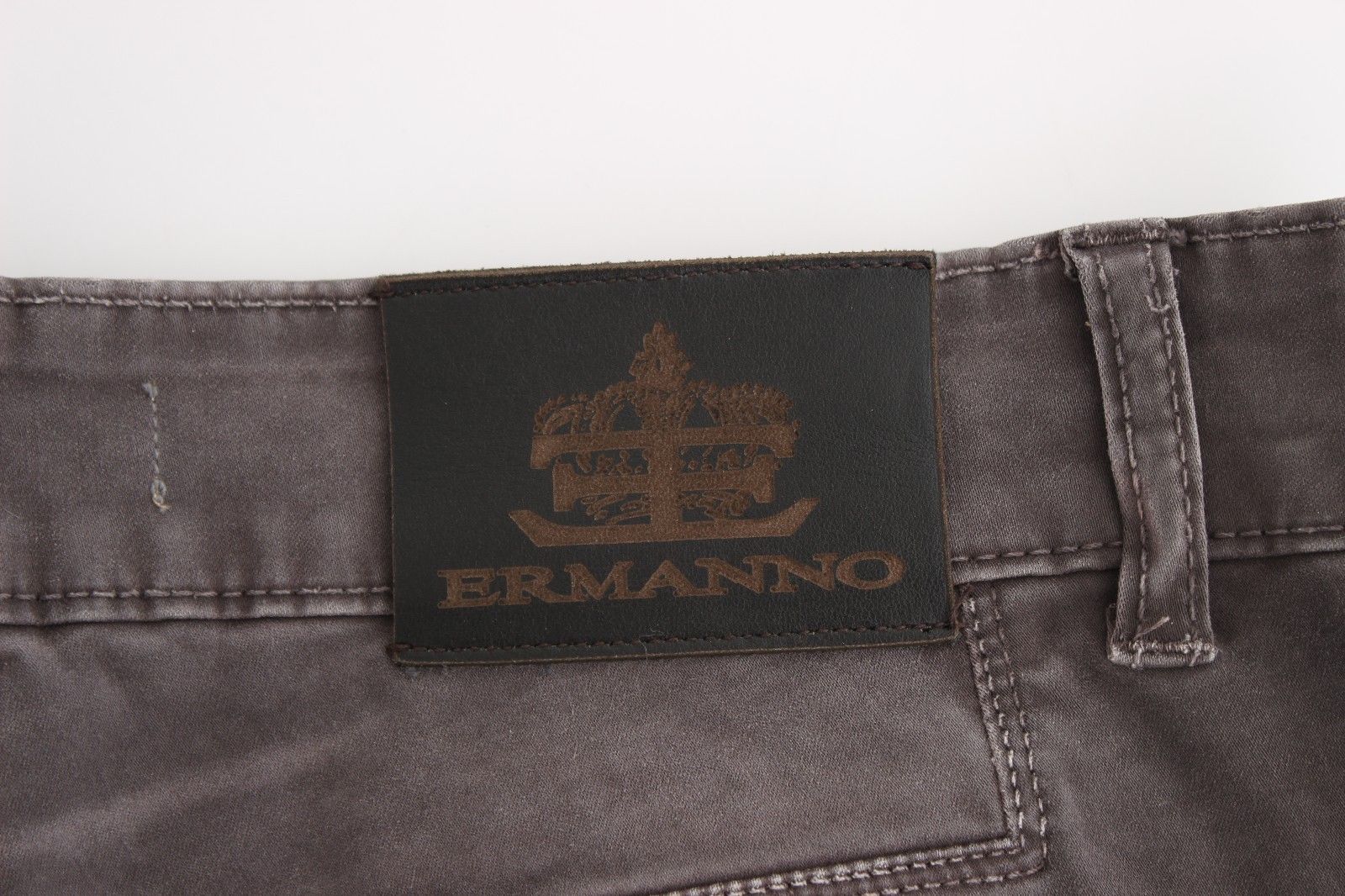 Pair of jeans with brand label on waistband