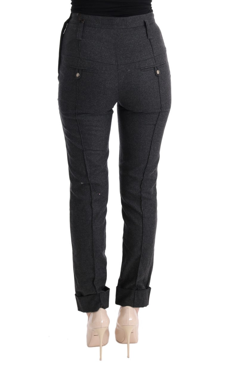 Pair of black skinny jeans with zipper detailing on legs