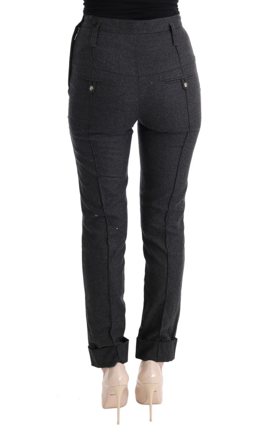 Pair of black skinny jeans with zipper detailing on legs