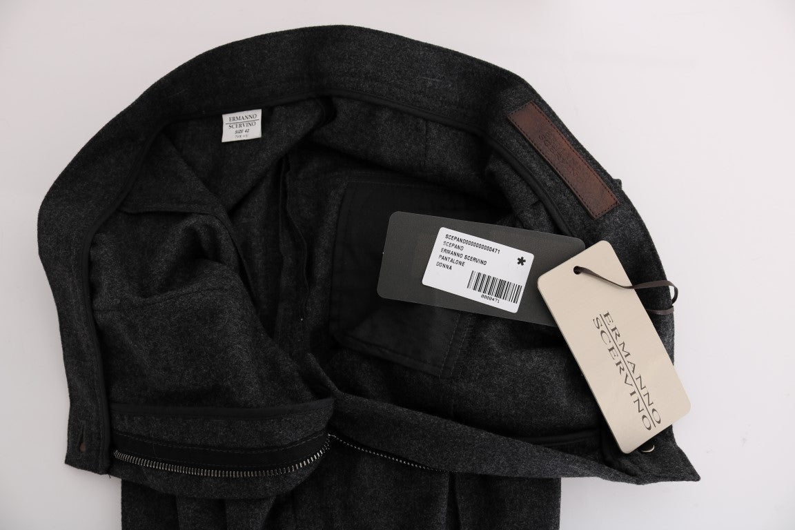 Black jacket on hanger with tag attached to sleeve
