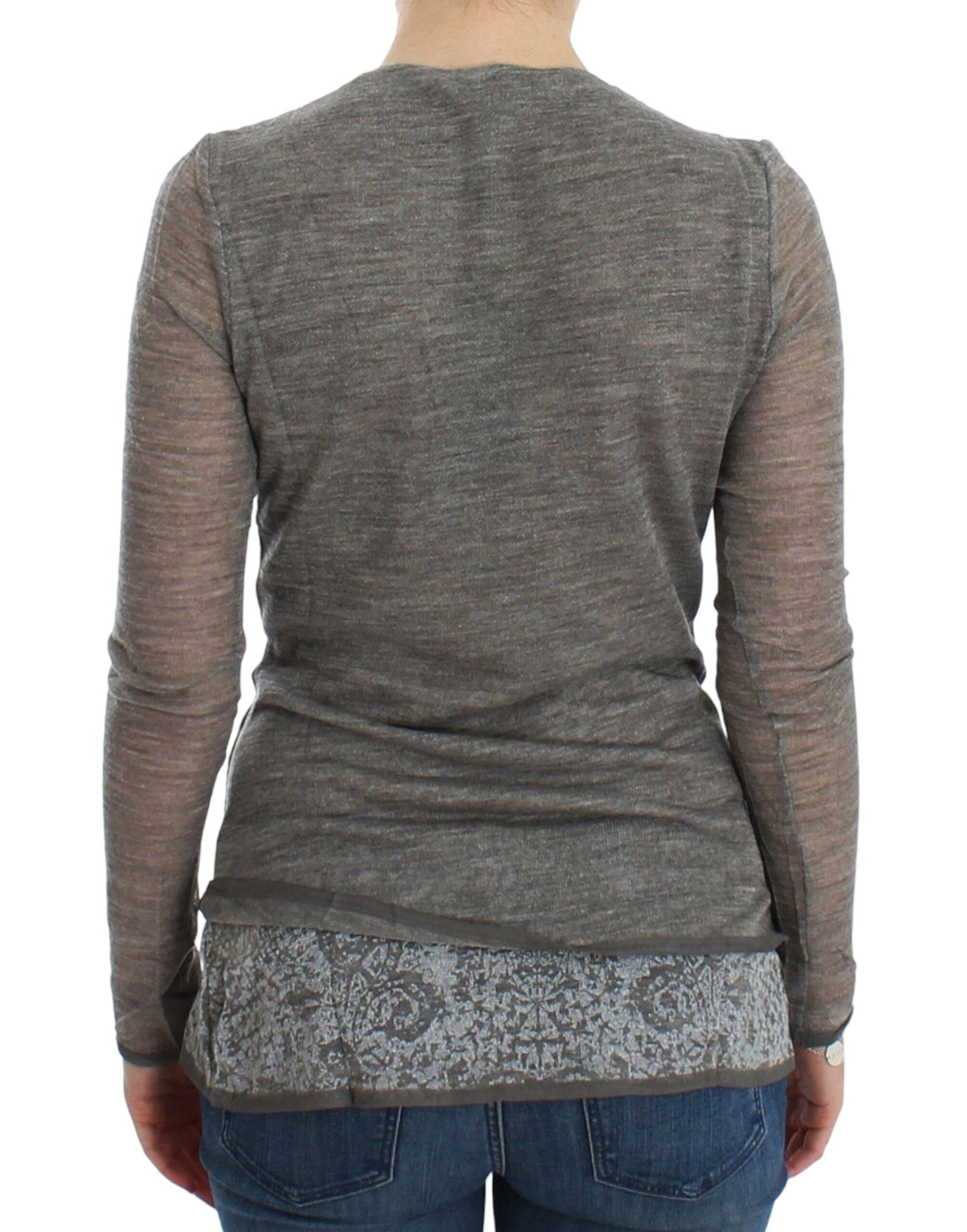 Long sleeve grey shirt on a person