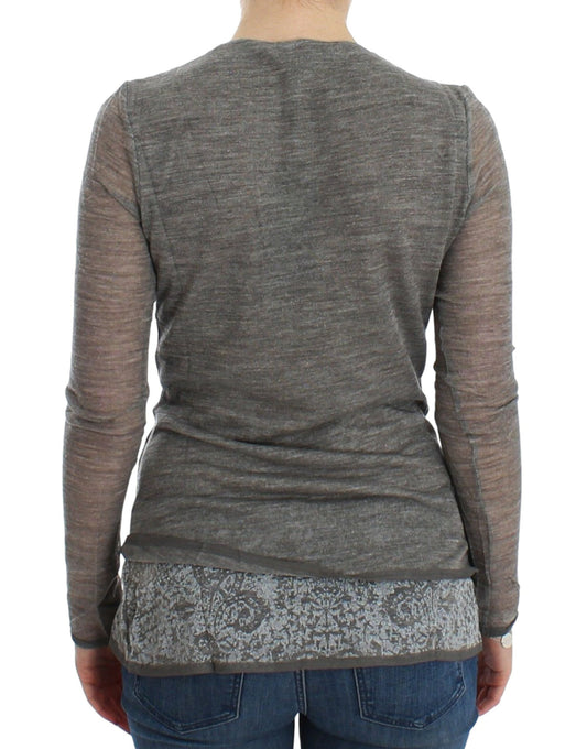 Long sleeve grey shirt on a person