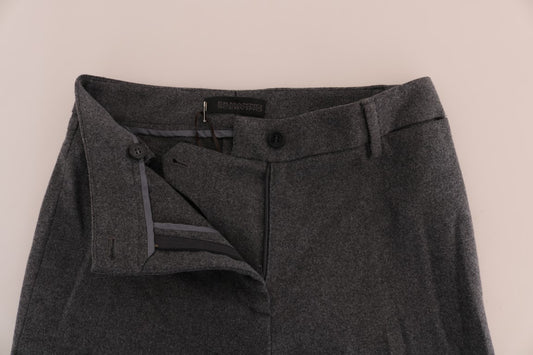 Pair of gray trousers with a zippered front pocket