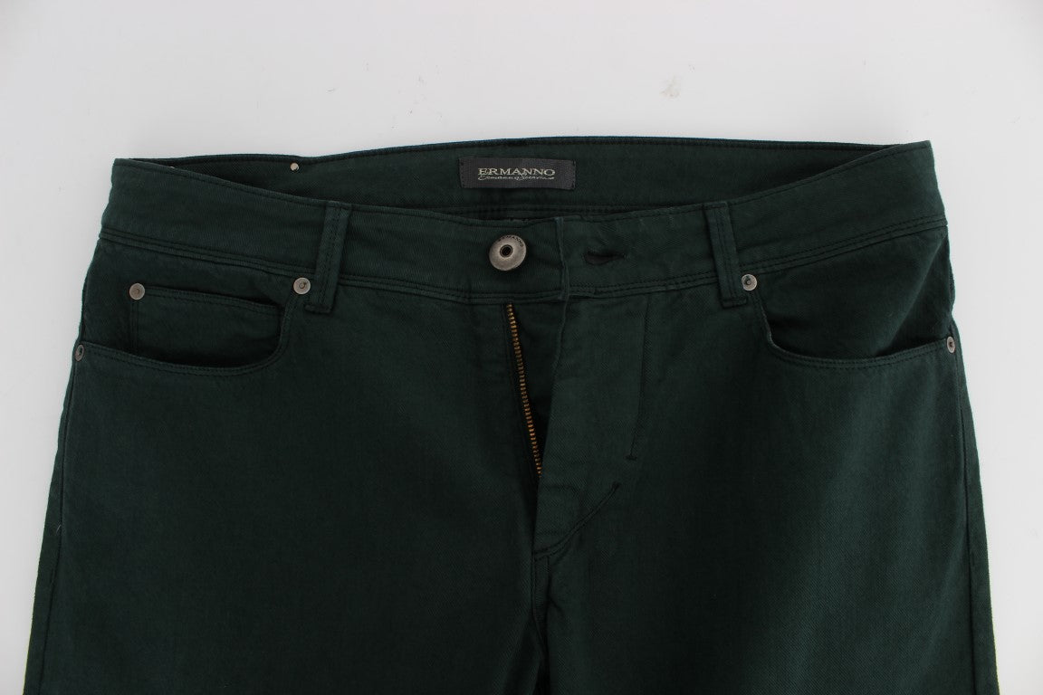 Pair of dark green jeans with zipper fly