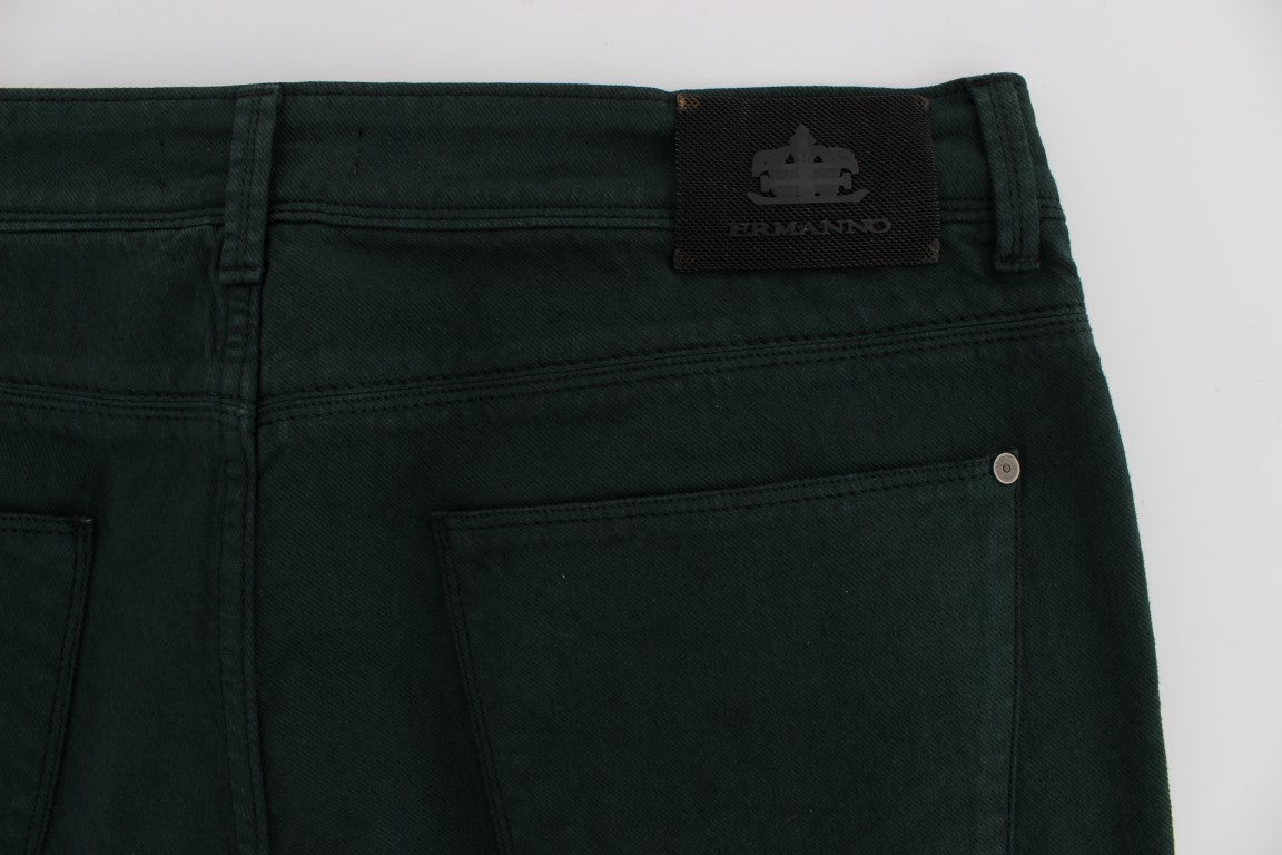 Pair of dark wash jeans with a small logo on the right side of the waistband