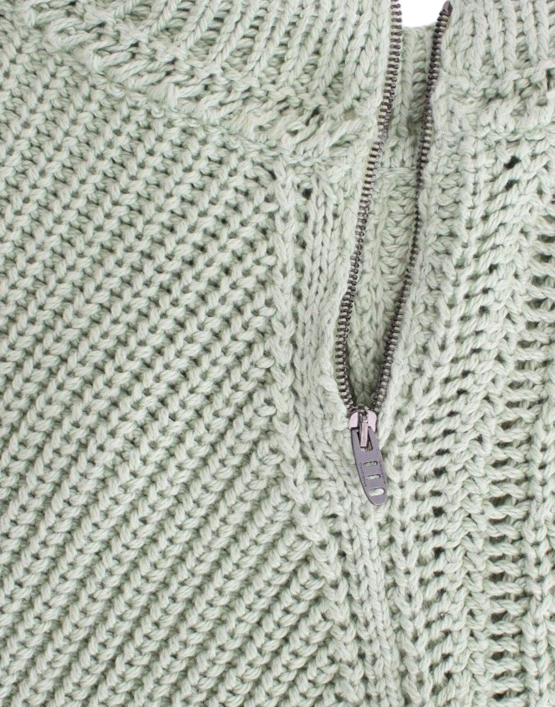 Knitted sweater with zippered neckline