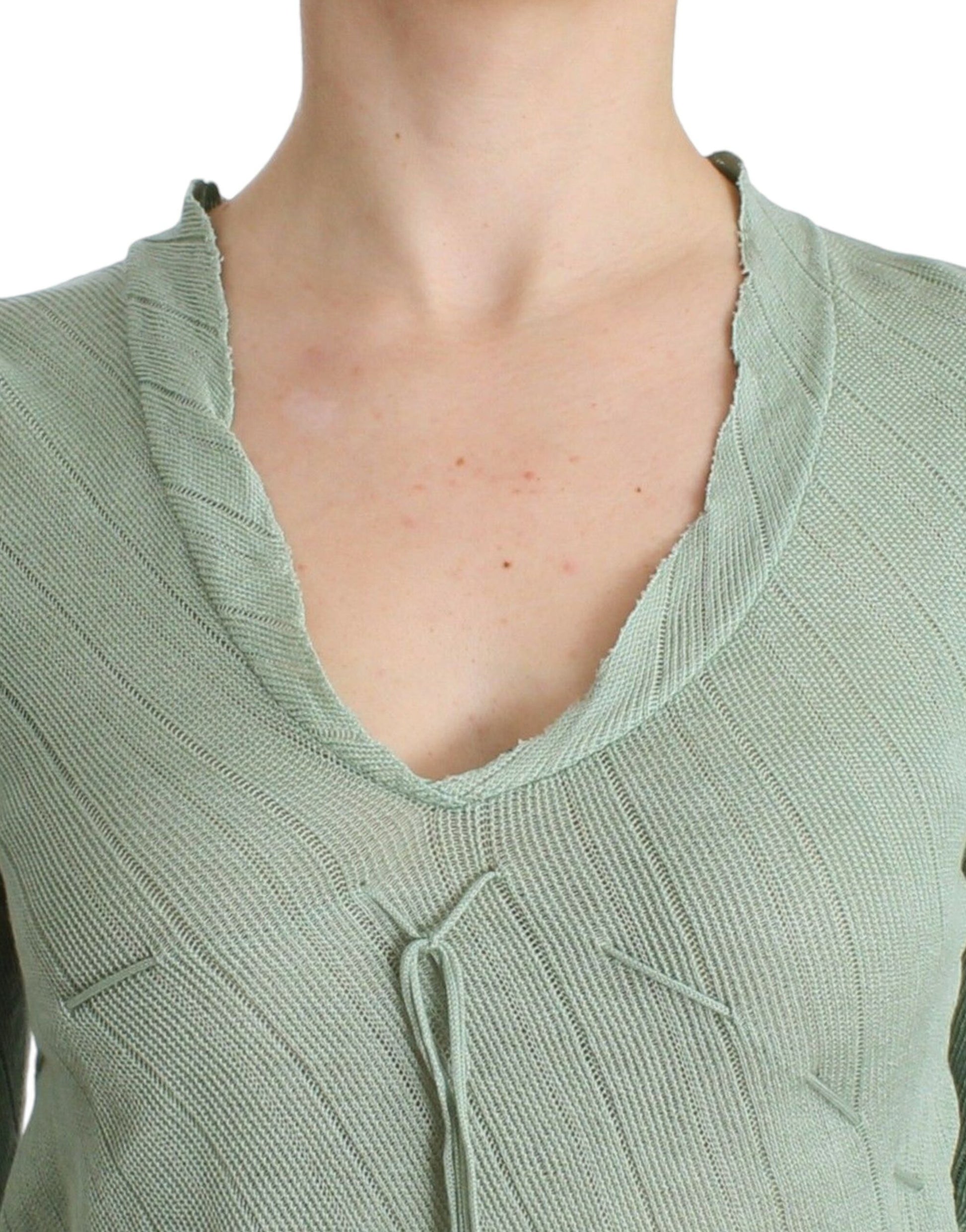 Woman's knit sweater with V neckline and ribbed cuffs