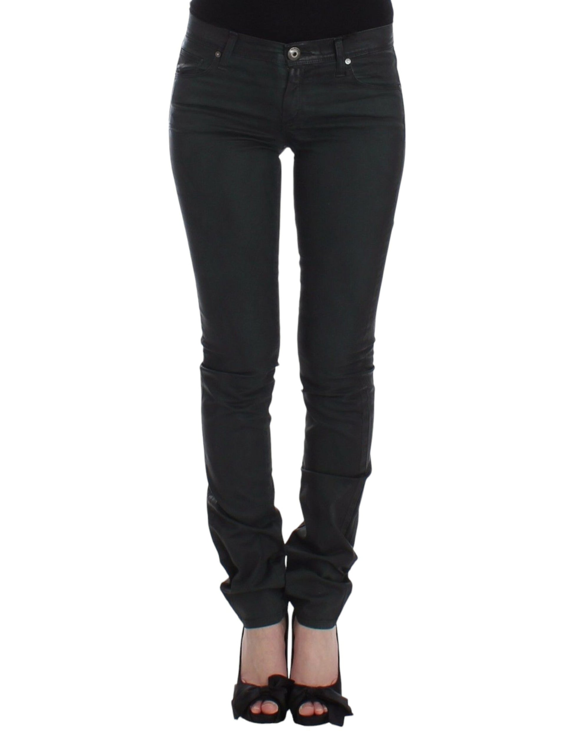 A pair of black skinny jeans on a mannequin