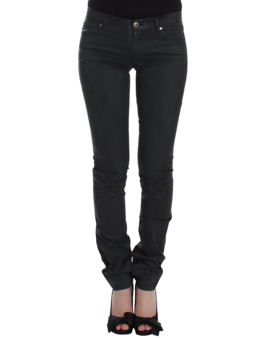 A pair of black skinny jeans on a mannequin