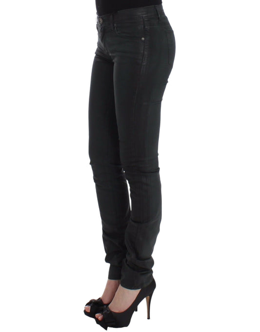 Woman wearing black pants and high heels