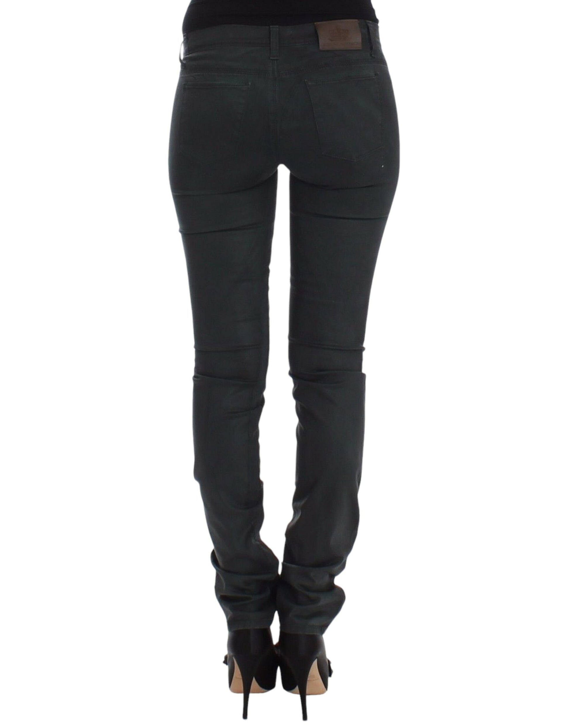 Pair of black skinny jeans with zipper detailing on legs