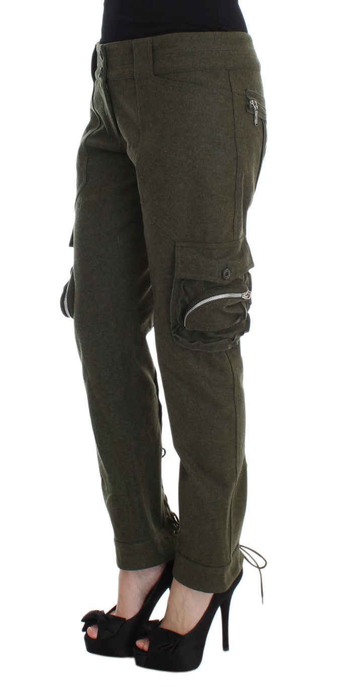 Pair of women's camouflage pants with zippered pockets and side slits