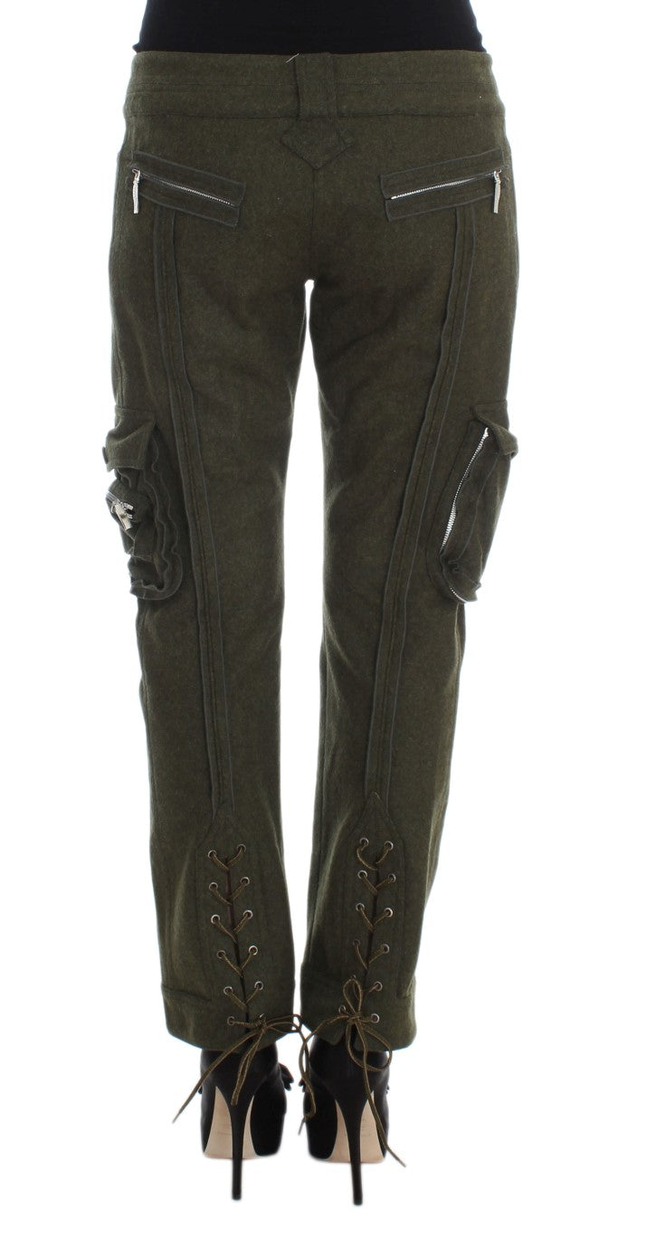 Pair of women's camouflage pants with pockets and zippers