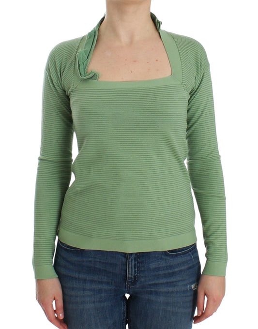 Green long sleeve sweater on woman