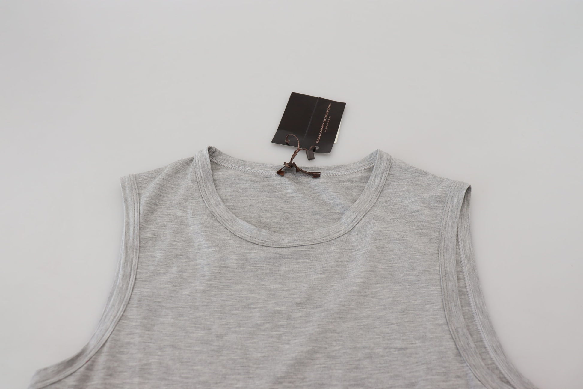 Grey tank top on hanger