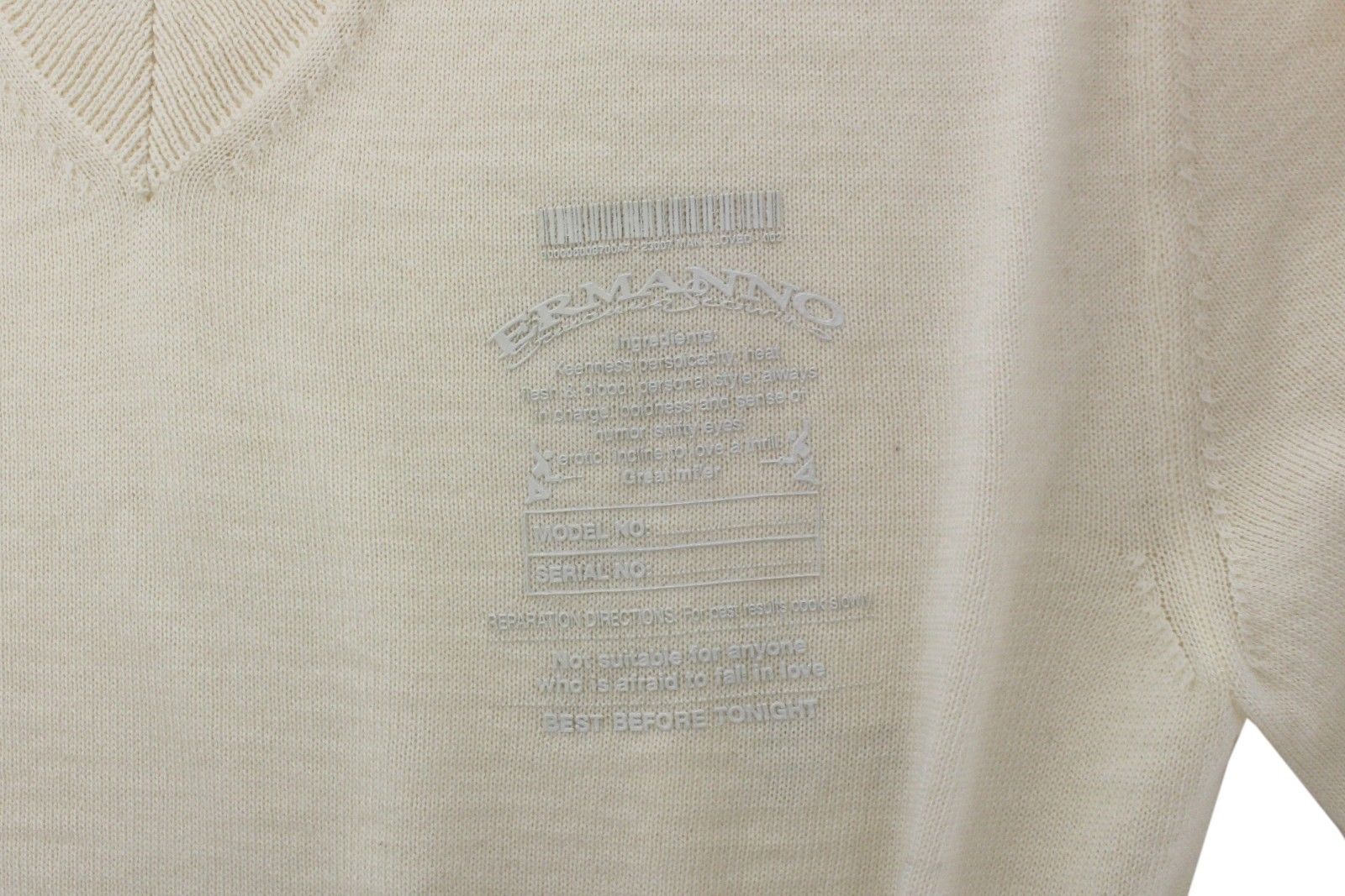 Knitted sweater with embroidered emblem on front