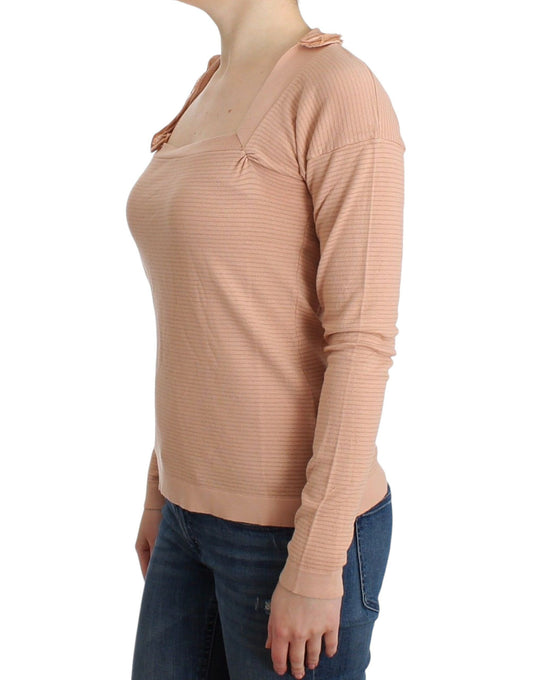 Long sleeve pink sweater on woman