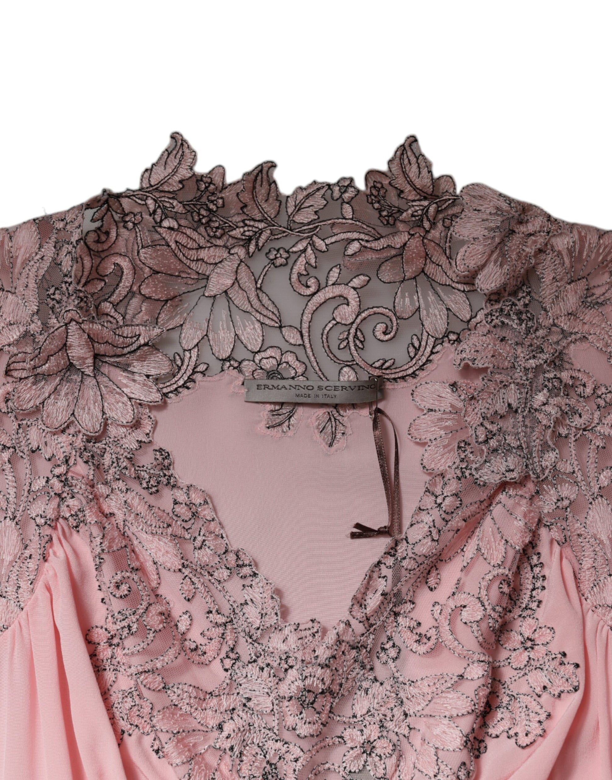 A pink floral lace midi dress with short sleeves and a V-neck