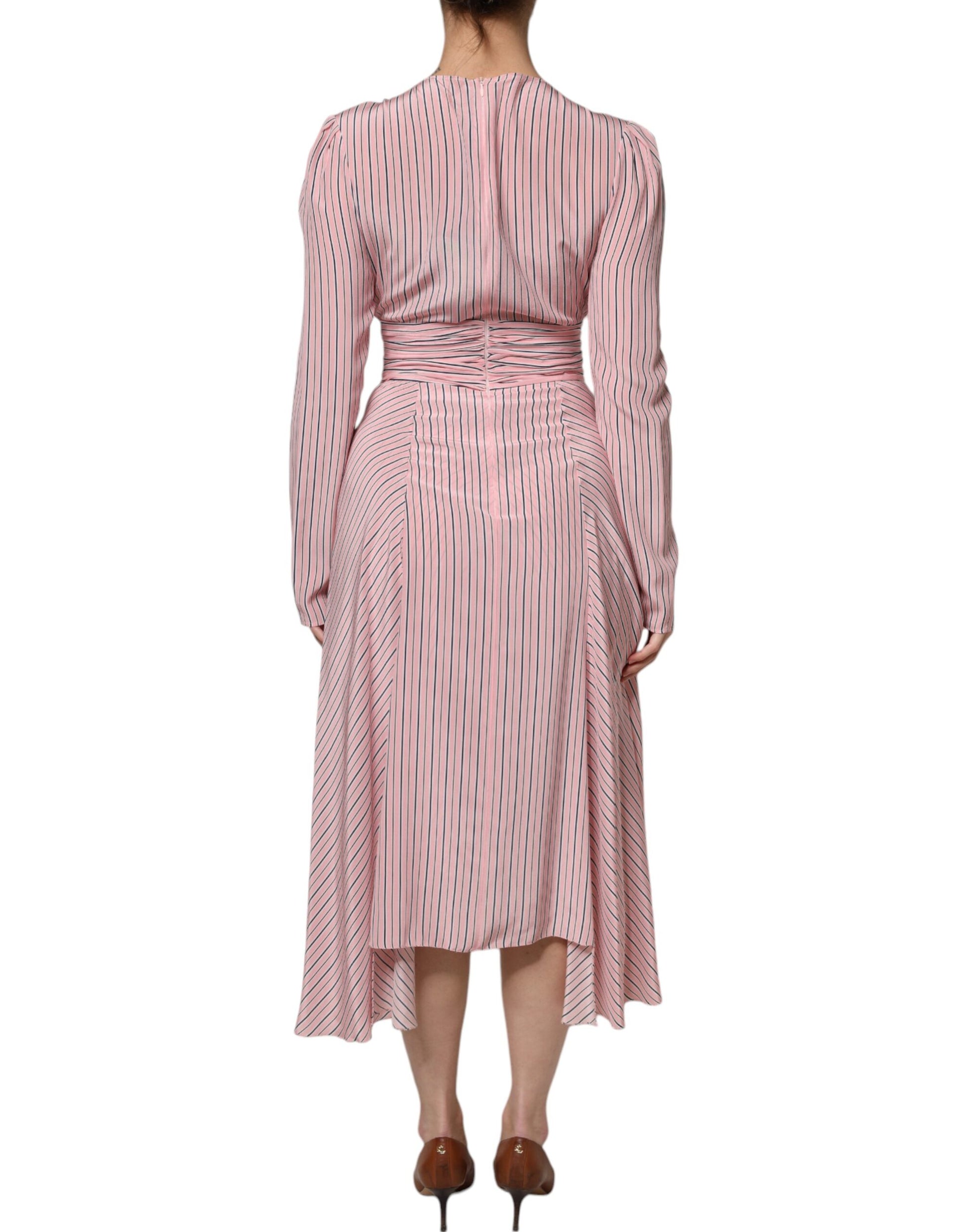 A long sleeve midi dress with pink stripes and a silky texture