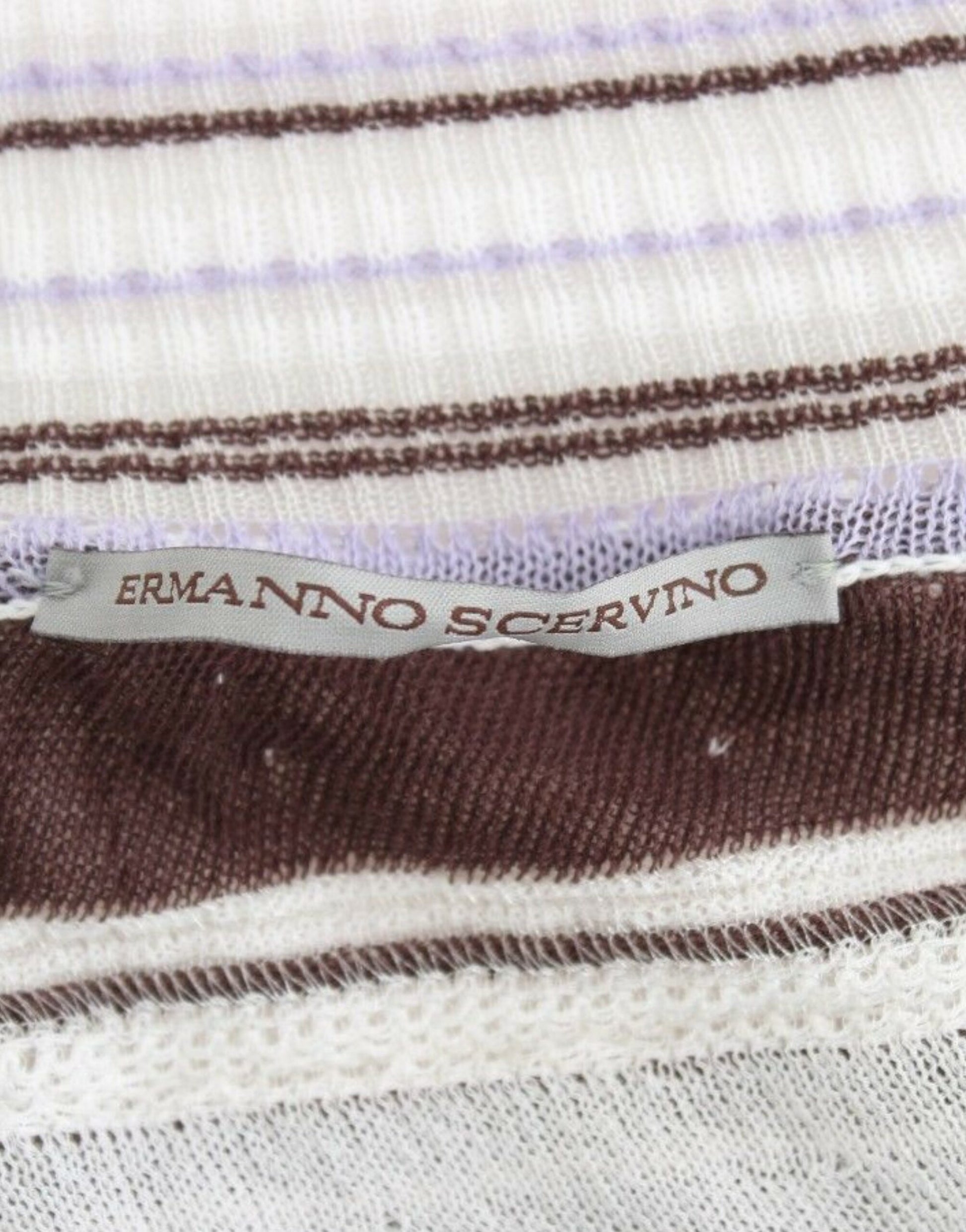 Brown and white striped fabric with a label that reads "ERMANNO SCREZI"