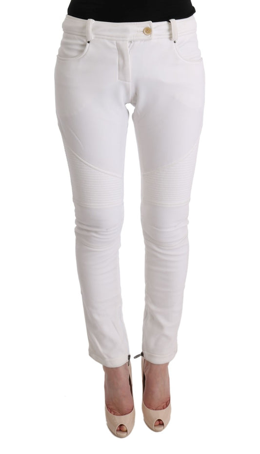 White skinny jeans with distressed knees