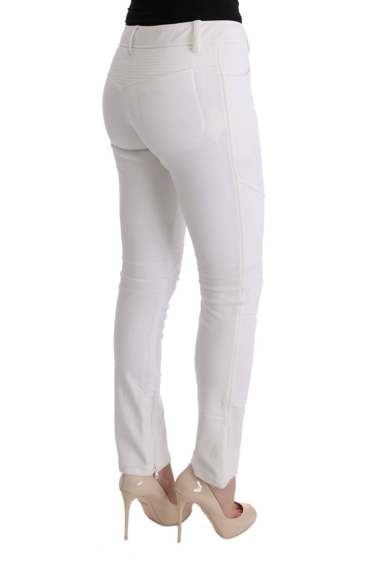 White skinny jeans with cutouts on legs