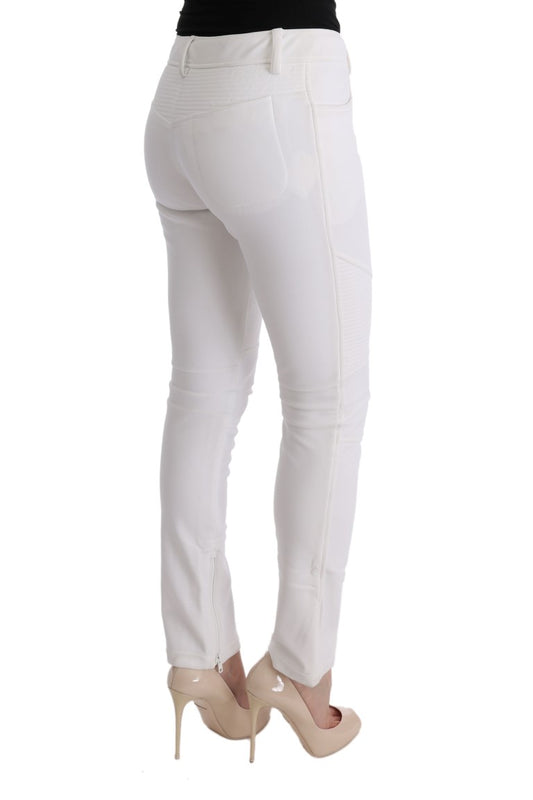 White skinny jeans with cutouts on legs