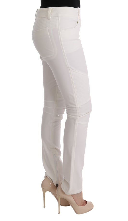 White skinny jeans with distressed details on legs