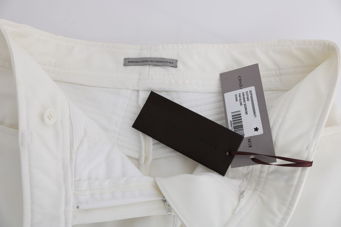 White shirt on hanger with tag attached to collar