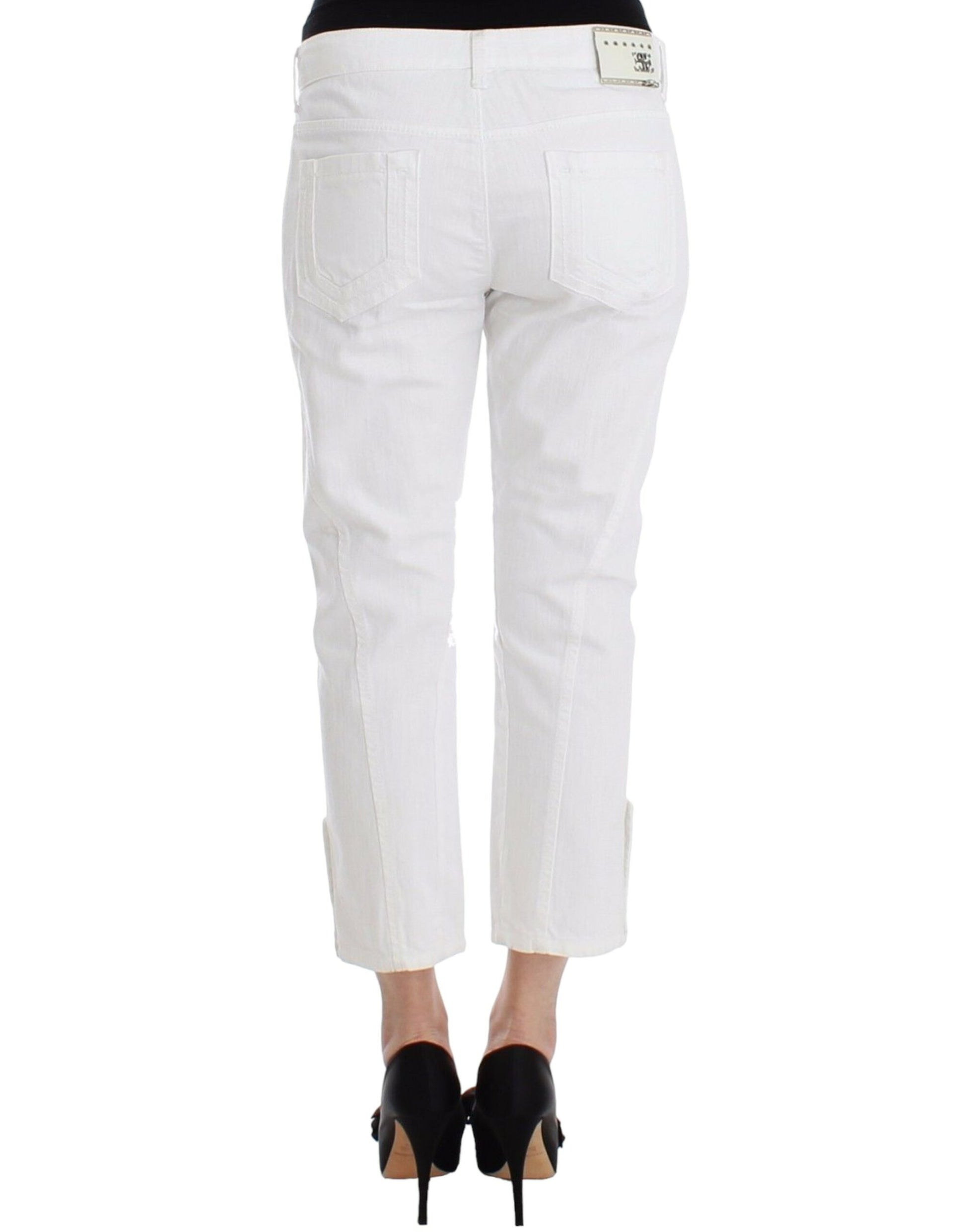 Pair of white cargo pants with pockets and a belt loop