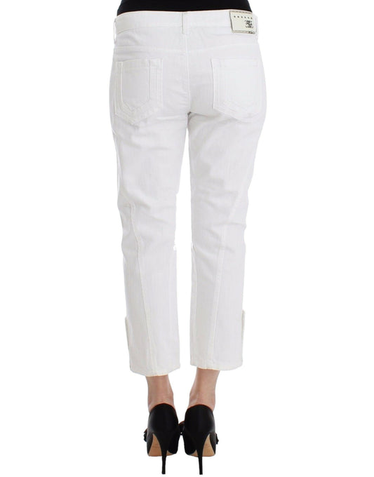 Pair of white cargo pants with pockets and a belt loop
