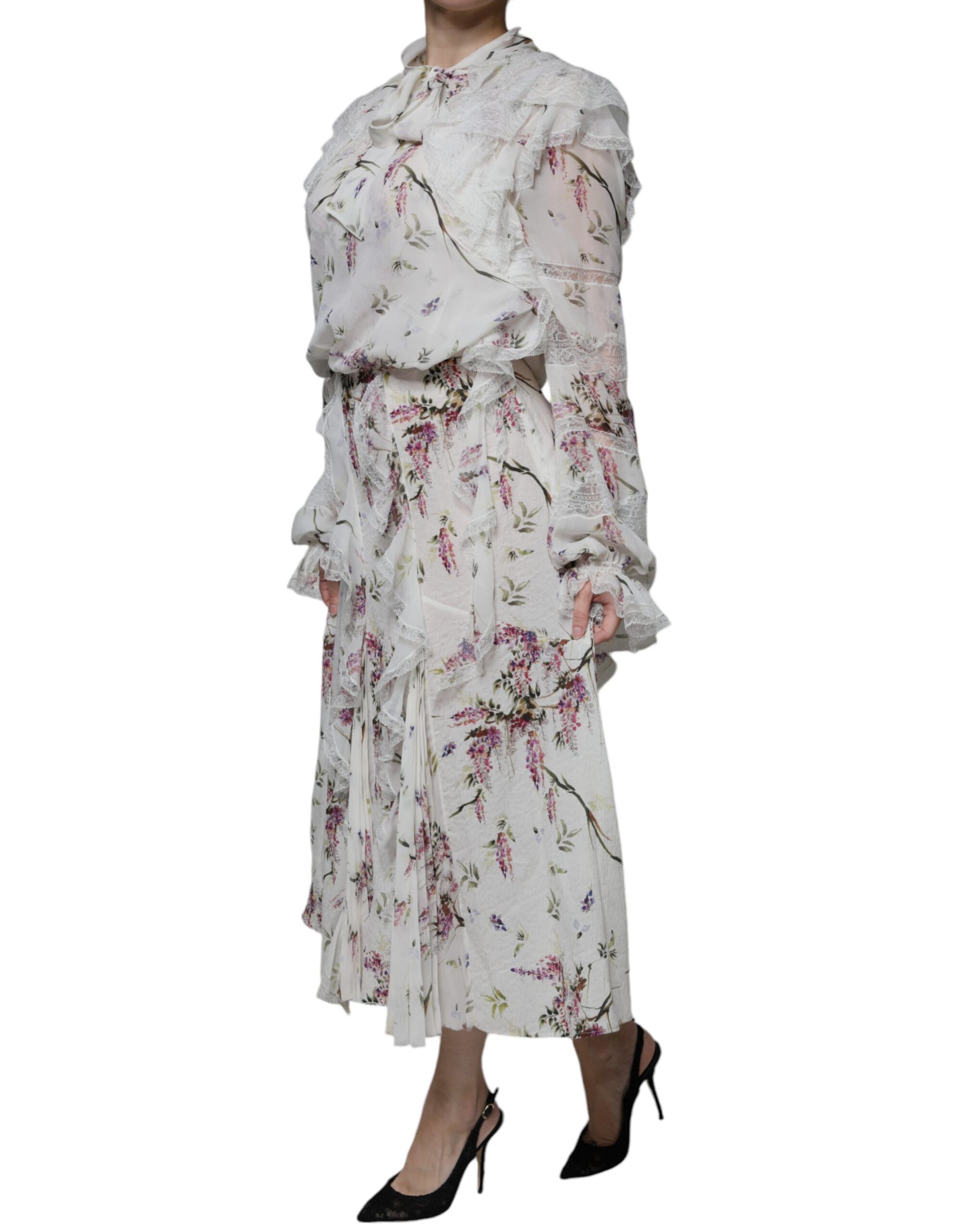 A long white floral lace dress with ruffled sleeves