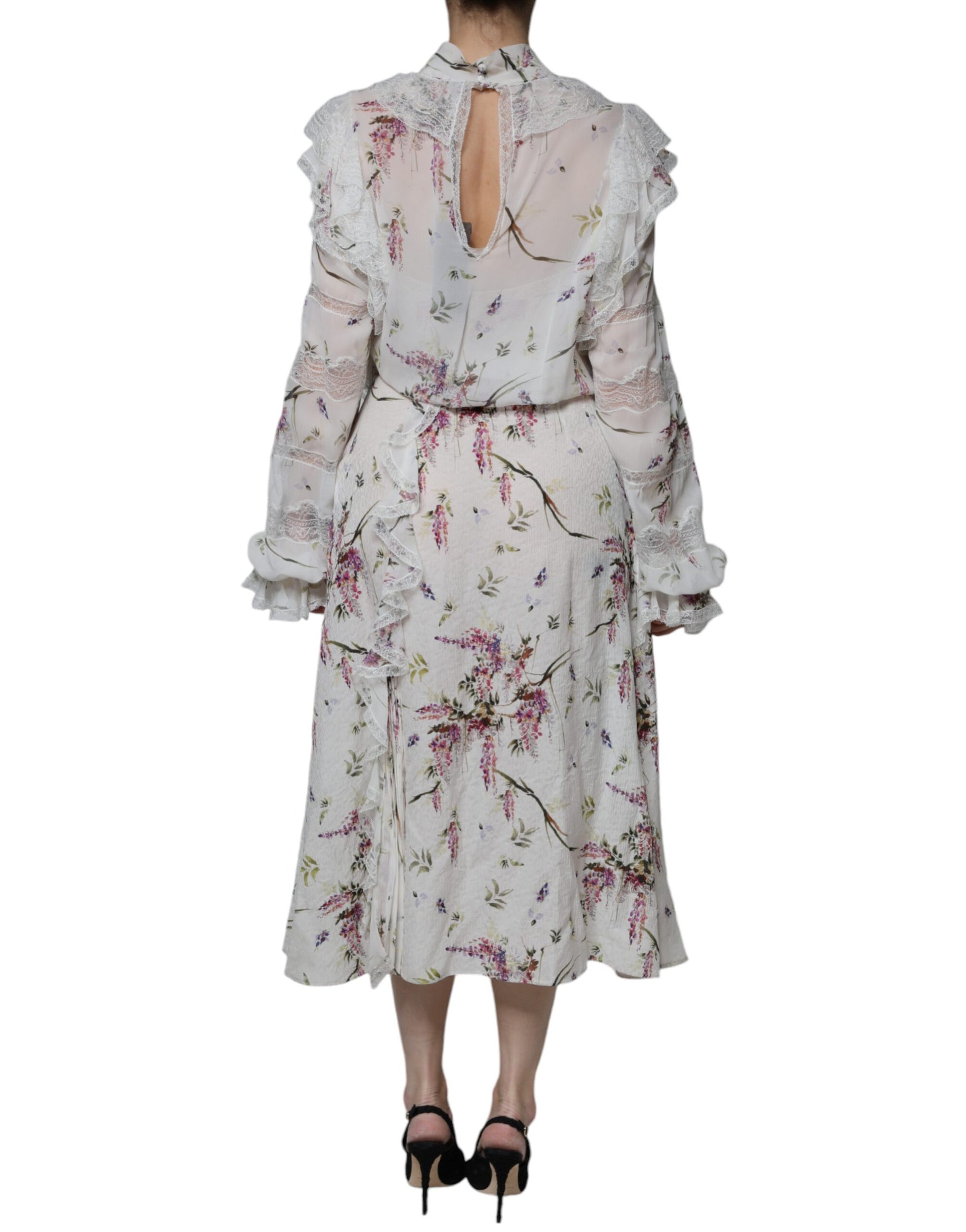 A long white floral lace maxi dress with ruffled sleeves