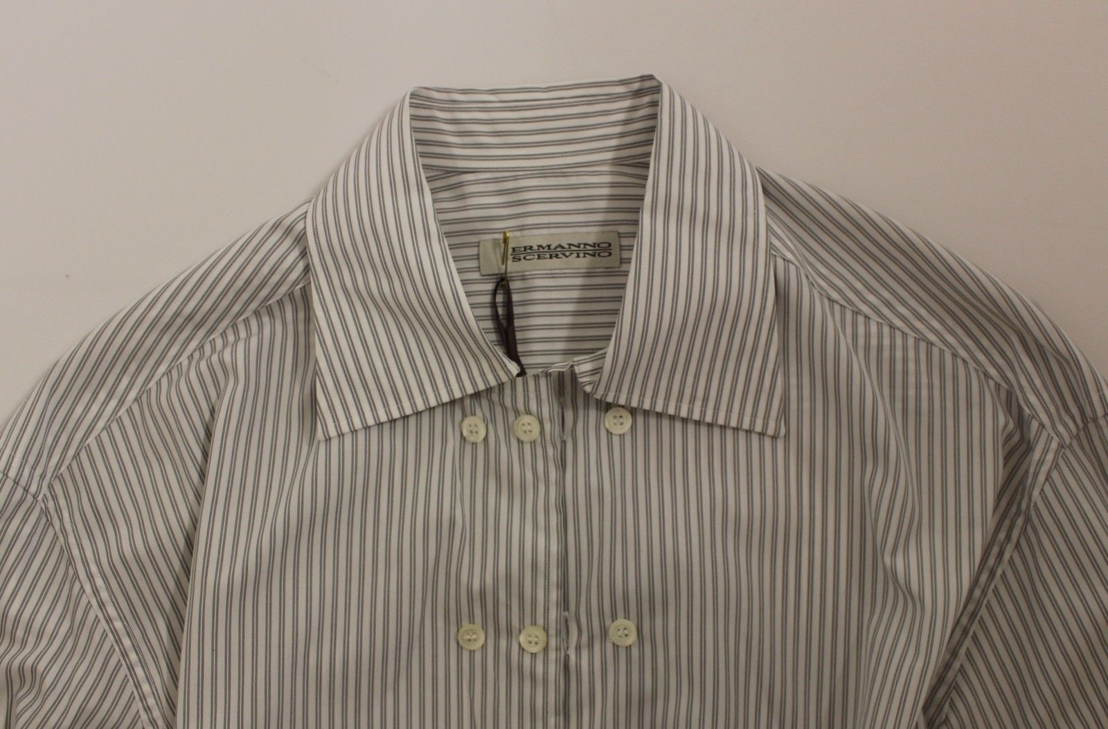 Men's button up shirt on hanger