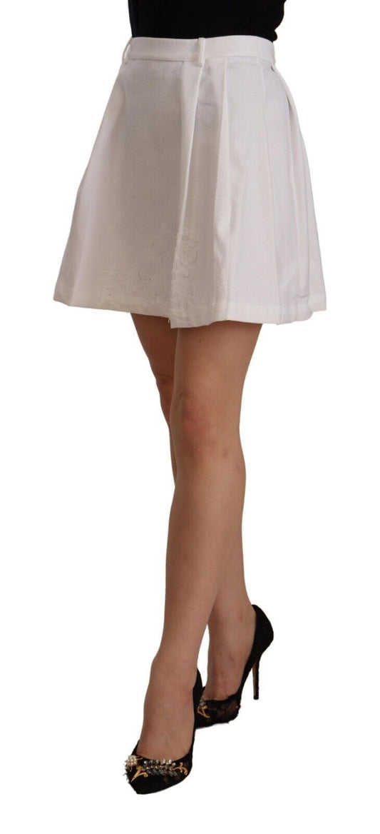 White pleated skirt worn by a woman