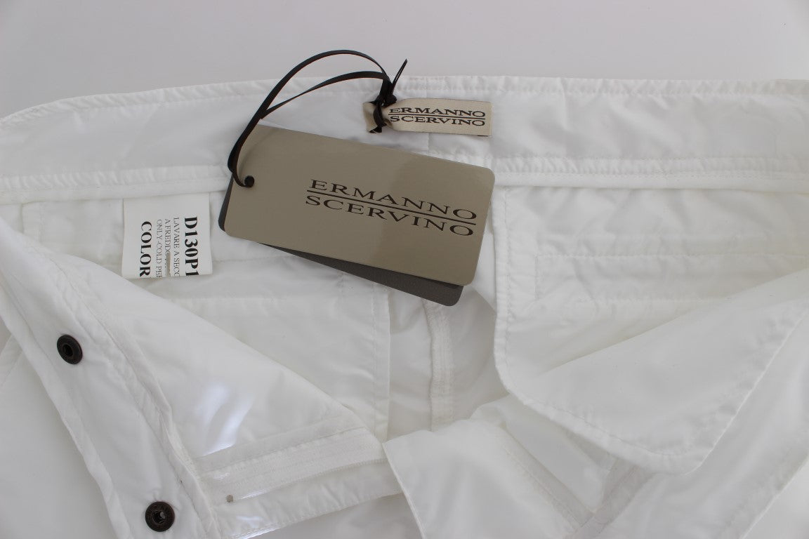 White raincoat on hanger with tag