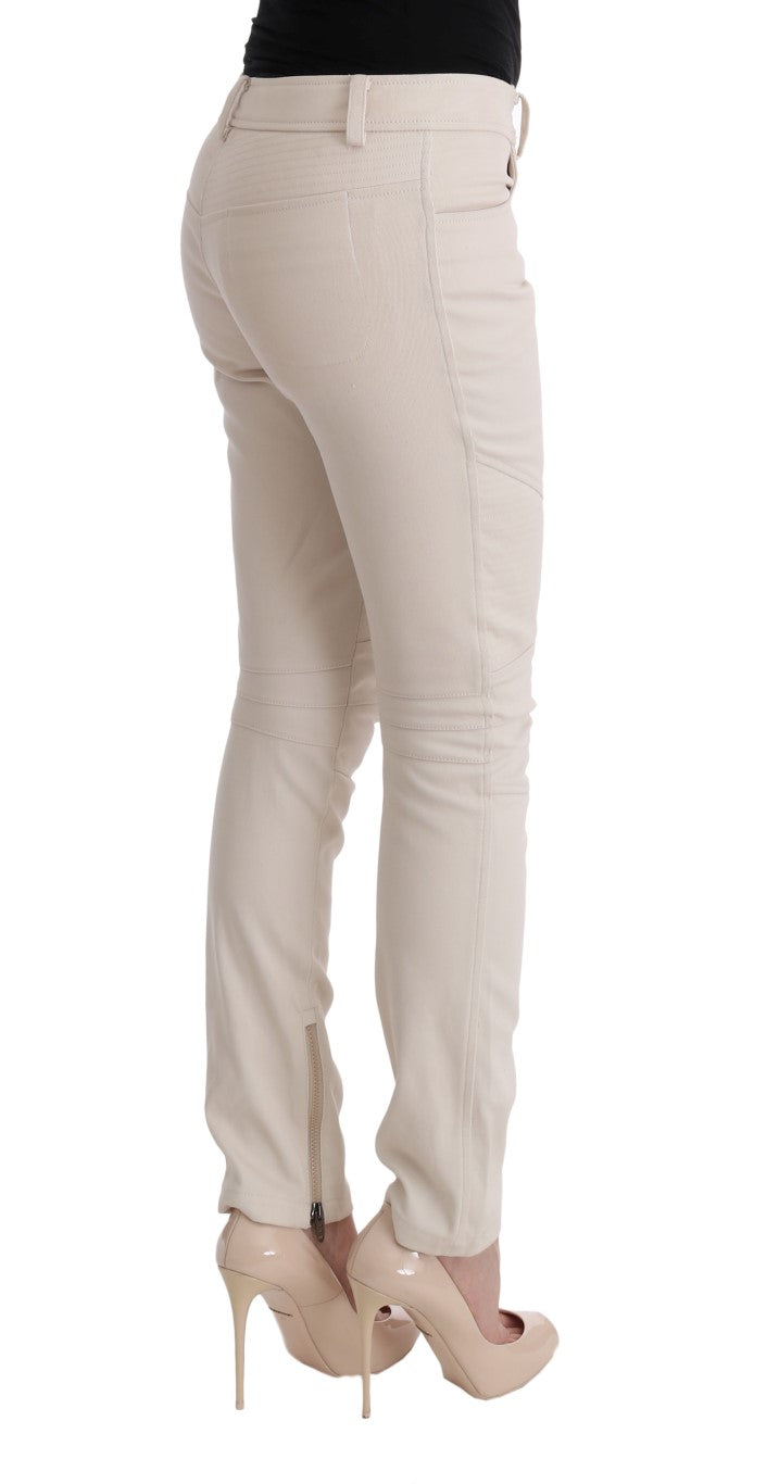 Woman wearing beige pants and tan heels