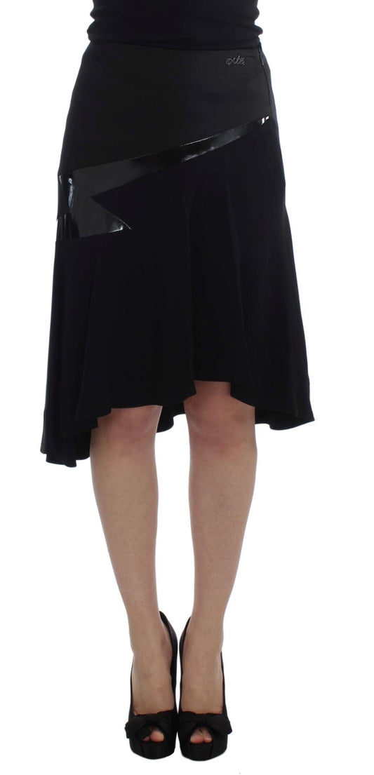 Woman wearing black dress and heels