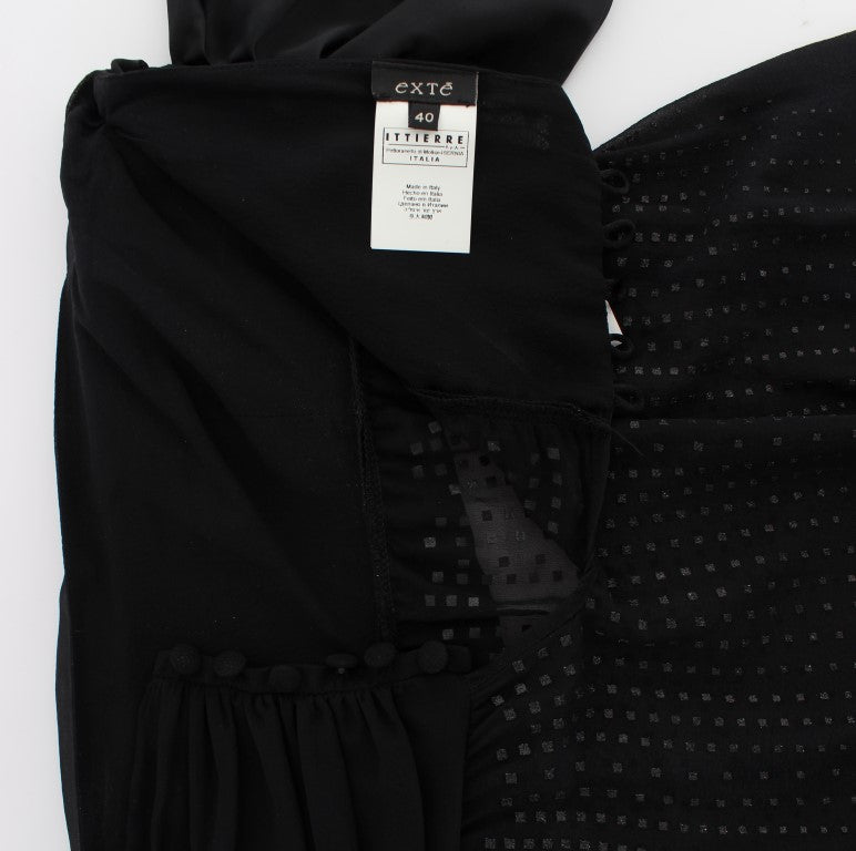 Black dress with ruffled sleeves and polka dots