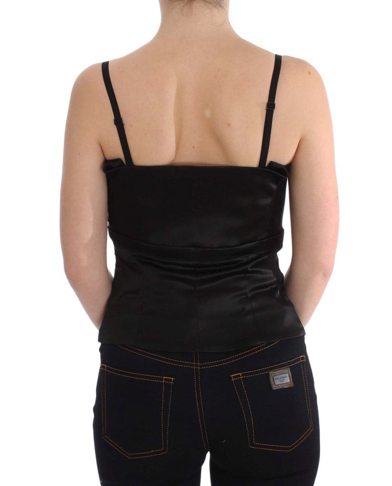 Black tank top and jeans on a woman's back