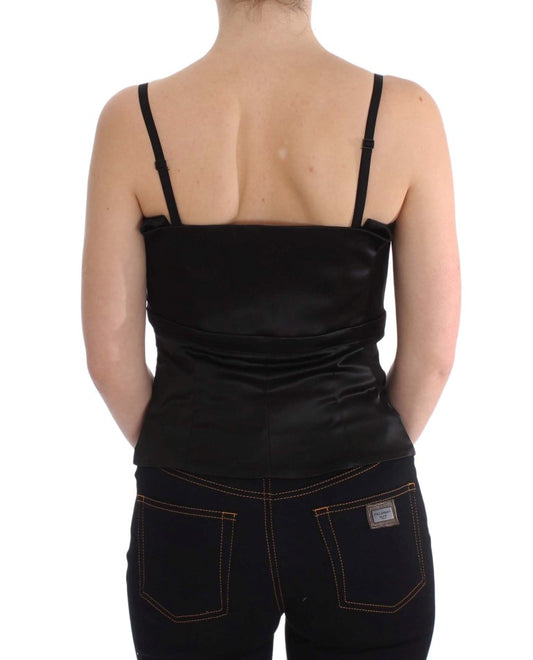 Black tank top and jeans on a woman's back