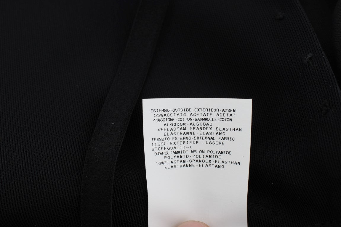 White tag on black fabric with printed instructions