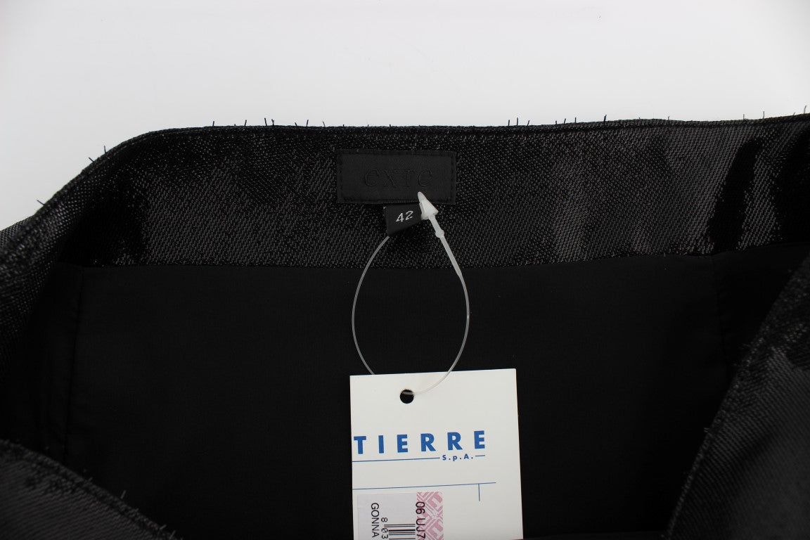 Black fabric item with white tag attached to it