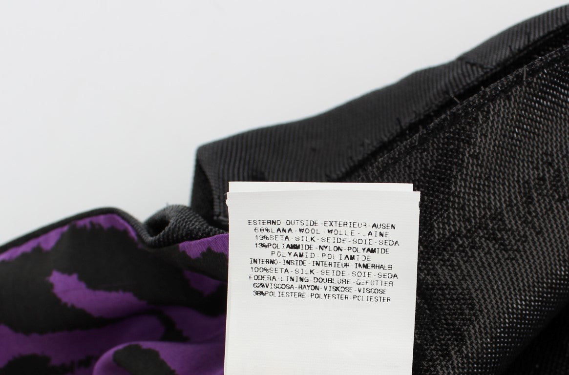 White tag on black fabric with printed information