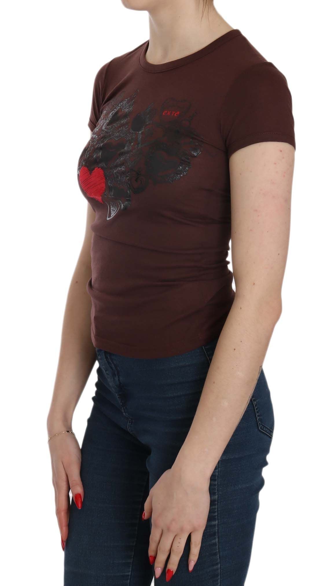 Woman wearing brown t-shirt with graphic design on front