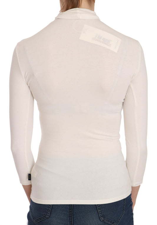 Long sleeve knit top on a mannequin