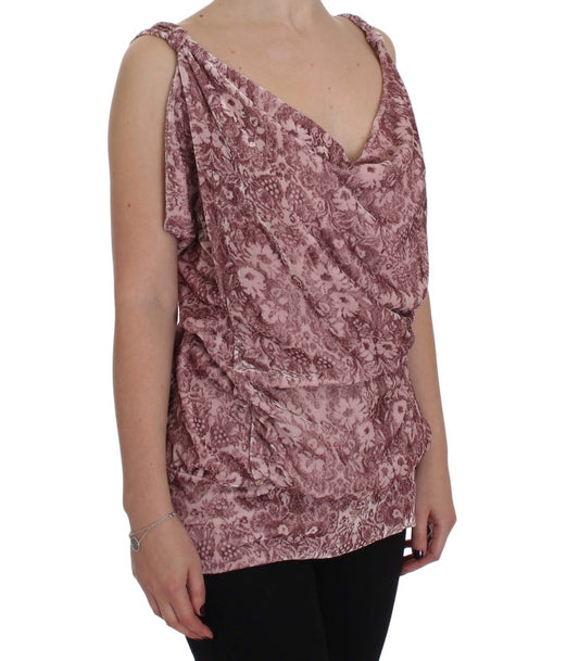 Woman wearing a sleeveless top with floral pattern