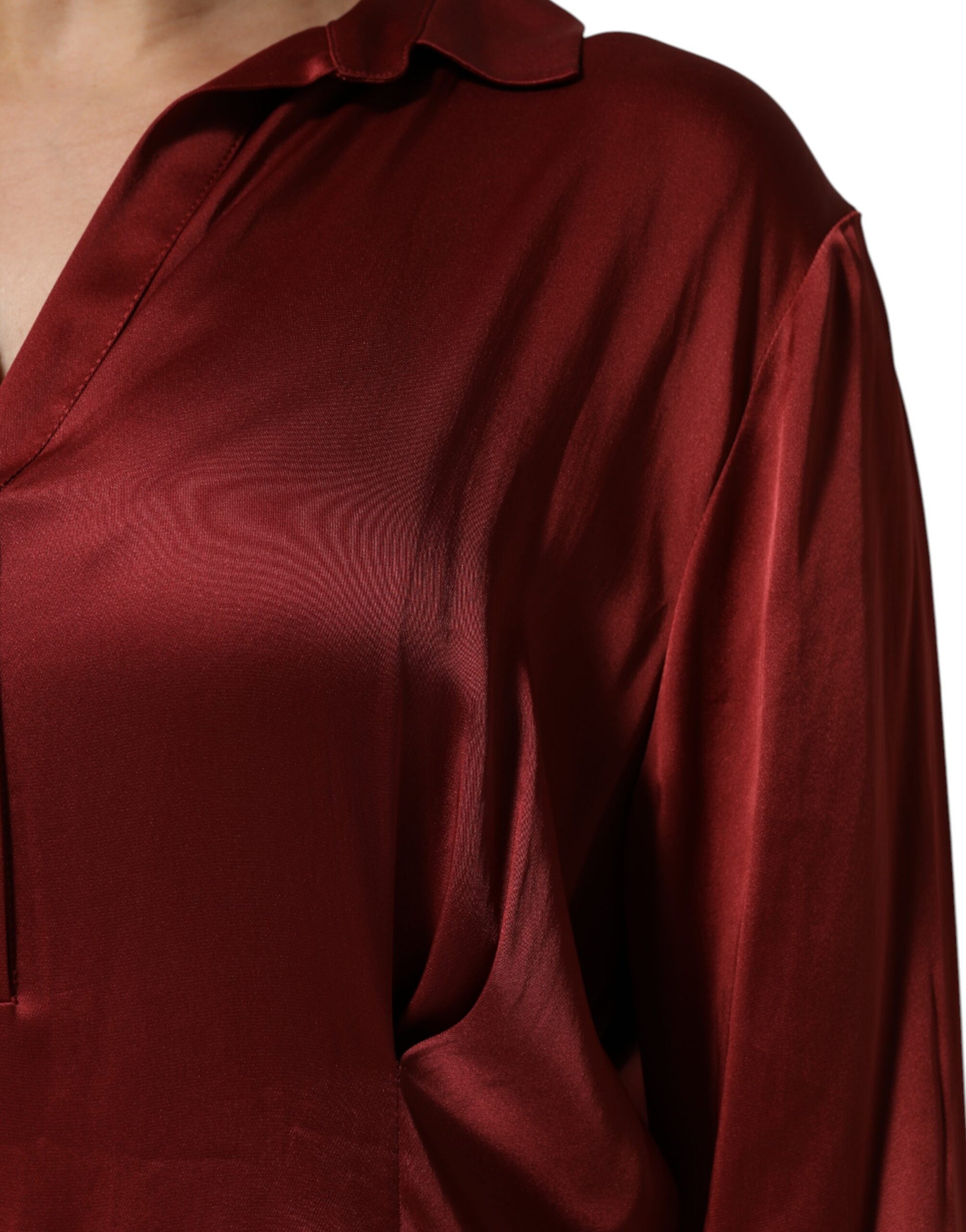 A long burgundy satin dress with acetate viscose fabric
