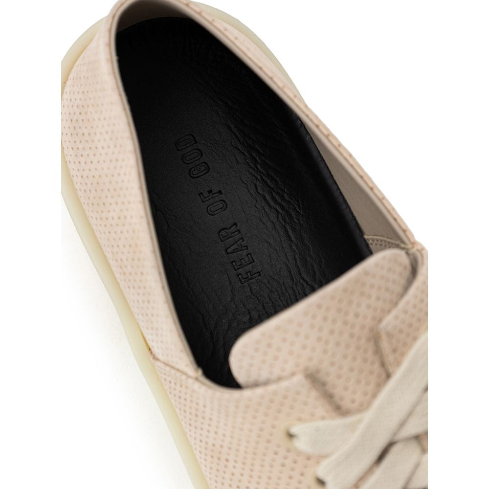Tan slip on shoe with black interior